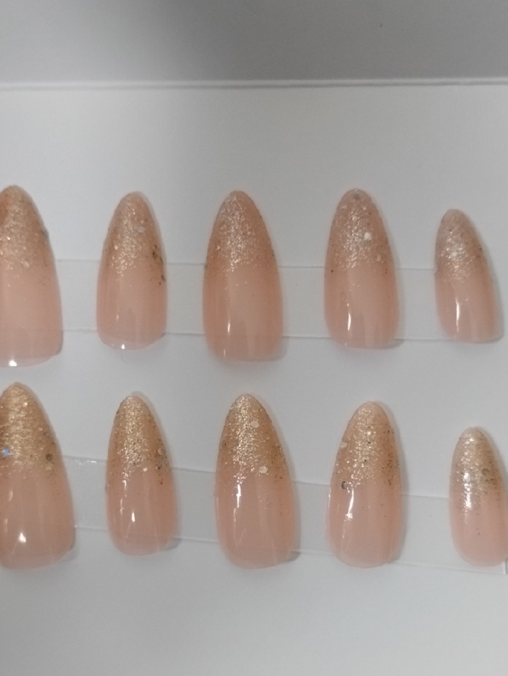 Nude Pink Press-On Nails with Gold Glitter Tips